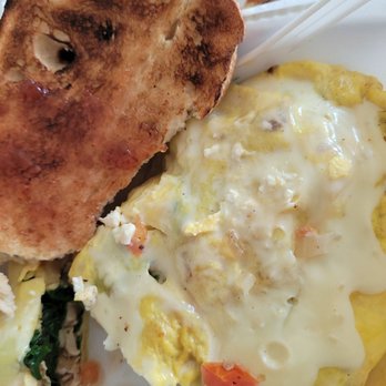 CJ's Cafe - Greek omelet with grilled chicken breast. Swiss on top. Buttered grilled sourdough. - Breakfast & Brunch Near Me - Los Angeles, California