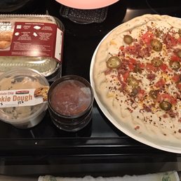 This is what we picked up for dinner tonight a large chicken bacon stuffed pizza add jalapeños and bread sticks and cookie dough This is what we picked up for dinner tonight a large chicken bacon stuffed pizza add jalapeños and bread sticks and cookie dough