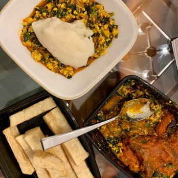 The Tribe Kitchen & Grill - Egusi with fufu (pounded yam) and fried yam on the side. - Caterers Near Me - Calumet City, Illinois The Tribe Kitchen & Grill - Egusi with fufu (pounded yam) and fried yam on the side. - Caterers Near Me - Calumet City, Illinois