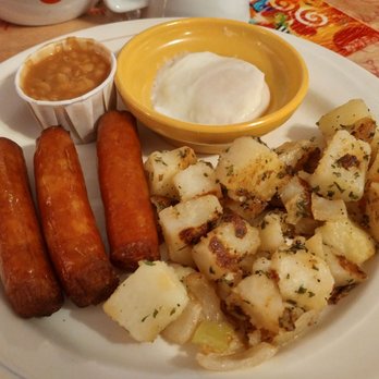 Chez Mo-Nik - a plate of food with sausages, potatoes, and beans - Breakfast & Brunch Near Me - Gatineau, Quebec Chez Mo-Nik - a plate of food with sausages, potatoes, and beans - Breakfast & Brunch Near Me - Gatineau, Quebec
