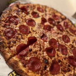 Large pepperoni pizza with garlic crust.