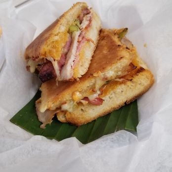 Frita Batidos - Inspired Cuban  Cuban basics:pressed sandwich w/ham, pork, pickle, cheese. But they've added bacon and switched up the type of cheese&pickle - Burgers Near Me - Detroit, Michigan