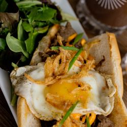 Khloe’s Kitchen - Korean Philly Cheese steak with Marinated Ribeye meat, crispy Furikaki Onions....Add a Sunny Side Egg!