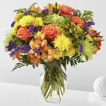 Tharp's Flowers - FTD Marmalade Skies bouquet. Dimensions listed at 24" tall by 18" wide in 8" tall vase. - Florists Near Me - Deming, New Mexico
