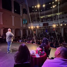 You can see we were by the entrance where the comics come to the stage. It's Phil Medina on stage doing his thing. You can see we were by the entrance where the comics come to the stage. It's Phil Medina on stage doing his thing.