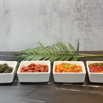 Krave Eatery - four bowls of different types of food - Afghan Near Me - Alexandria, Virginia Krave Eatery - four bowls of different types of food - Afghan Near Me - Alexandria, Virginia