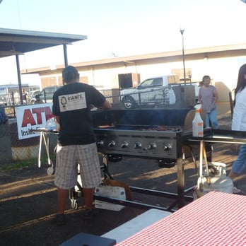 Kiani's Original Guava Chicken - a man and a woman grilling - Food Stands Near Me - Honolulu, Hawaii Kiani's Original Guava Chicken - a man and a woman grilling - Food Stands Near Me - Honolulu, Hawaii