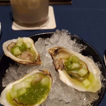 Coasterra - Aguachile oysters and Deb's coconut margarita. - Mexican Near Me - San Diego, California Coasterra - Aguachile oysters and Deb's coconut margarita. - Mexican Near Me - San Diego, California