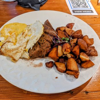 Papi Cuisine - Steak, eggs, and home fries. A classic done right - Cocktail Bars Near Me - Baltimore, Maryland