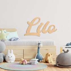CocoNene - Kahala - Custom wood name scripts, exclusively available through our Coco Crafted program at Kahala Mall. Crafted in wood. Personalized for you!