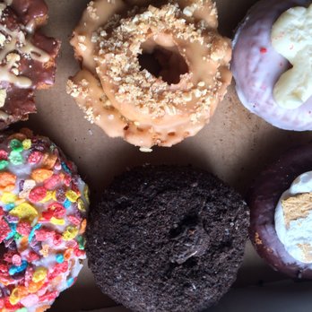 Joe Donut - (T) snickers, salted caramel & toffee, red velvet; (B) fruity pebbles, oreo crush, smores $13.18(w/ tax) - Donuts Near Me - Glenview, Illinois