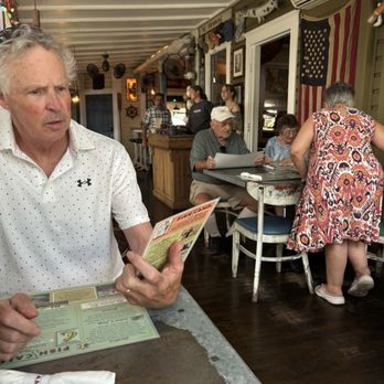 Owens Fish Camp - Porch - Seafood Near Me - Sarasota, Florida Owens Fish Camp - Porch - Seafood Near Me - Sarasota, Florida