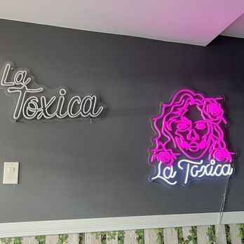 La Toxica - a neon sign in a restaurant - Mexican Near Me - Montreal, Quebec La Toxica - a neon sign in a restaurant - Mexican Near Me - Montreal, Quebec