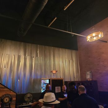 Zodi'X Cigar Lounge - a man in a white hat - Cigar Bars Near Me - Round Rock, Texas Zodi'X Cigar Lounge - a man in a white hat - Cigar Bars Near Me - Round Rock, Texas