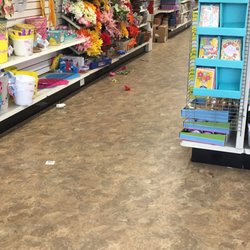 Dollar Tree - Trash on the floor everywhere you look. It doesn't look like they cleaned up in months.