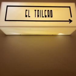 El Trilero - Sign pointing to downstairs bar