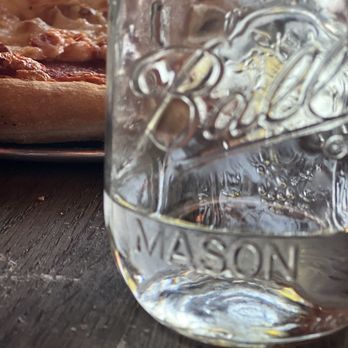 Prohibition Lounge - Pepperoni pizza and the water glass. - Pizza Near Me - Norman, Oklahoma Prohibition Lounge - Pepperoni pizza and the water glass. - Pizza Near Me - Norman, Oklahoma