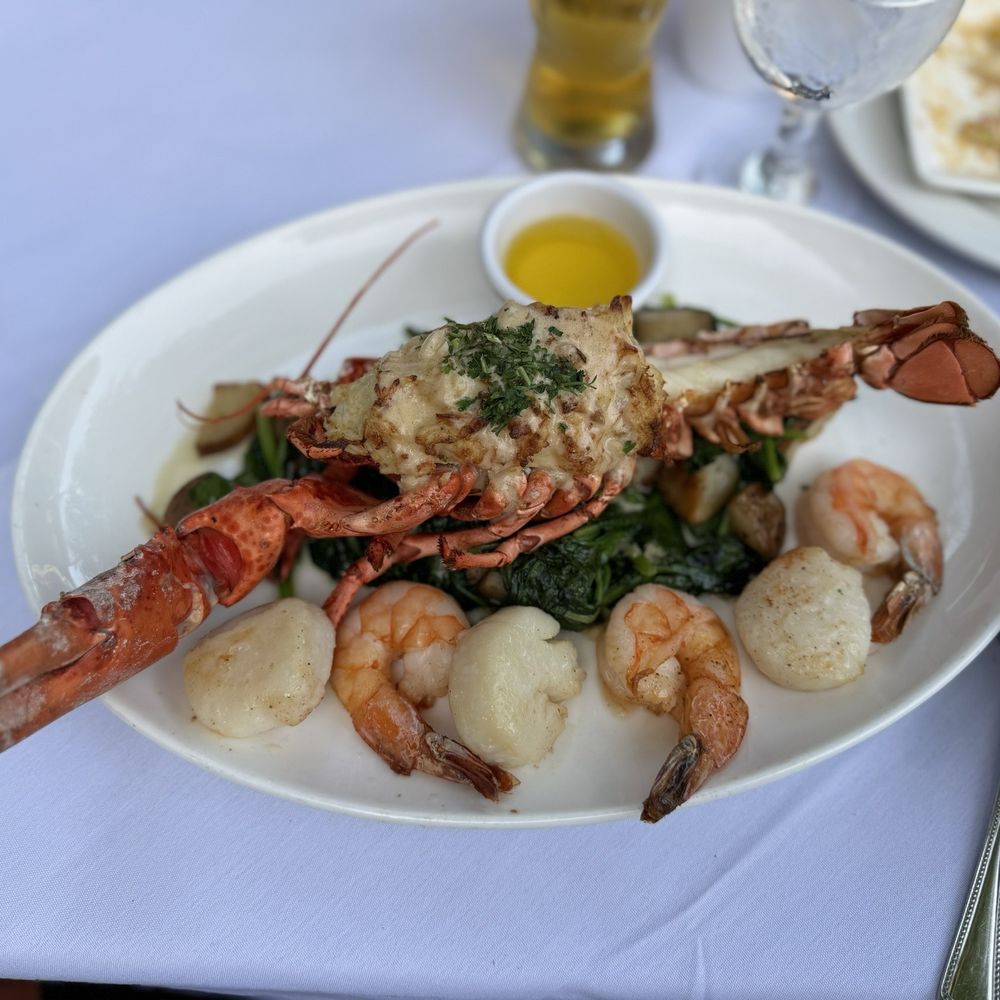 The Wharf - Stuffed Lobster, scallops, shrimps, potatoes and spinach - Seafood Near Me - Alexandria, Virginia