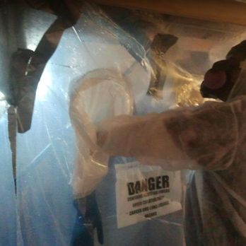 AllSafe Construction - a man in a hazmat suit - General Contractors Near Me - Harrisburg, Pennsylvania
