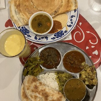 Chili's South Indian Restaurant - Paneer Dosa ($11.99) on top, Mango Lassi, Thali - Indian Near Me - Seattle, Washington Chili's South Indian Restaurant - Paneer Dosa ($11.99) on top, Mango Lassi, Thali - Indian Near Me - Seattle, Washington
