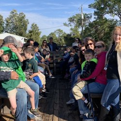 Tractor-drawn wagon ride farm tour at Worden Farm