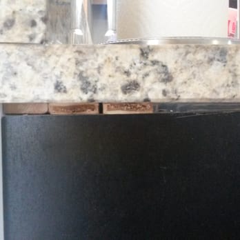 1895 Granite - They brought two different thicknesses of granite and shimmed the end to make the two pieces seem to meet - Refinishing Services Near Me - Alpharetta, Georgia 1895 Granite - They brought two different thicknesses of granite and shimmed the end to make the two pieces seem to meet - Refinishing Services Near Me - Alpharetta, Georgia