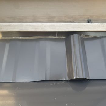 Strait Line Roofing - Improperly flashed former, screws through siding. - Roofing Near Me - White Lake, New York Strait Line Roofing - Improperly flashed former, screws through siding. - Roofing Near Me - White Lake, New York