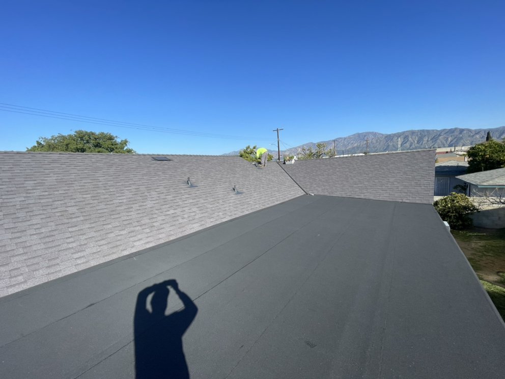 Slide of New Village Roofing