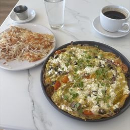Kalamata frittata. I travel a lot. This has to be one the best cafe breakfast places I have been to in the country. Great job!! Kalamata frittata. I travel a lot. This has to be one the best cafe breakfast places I have been to in the country. Great job!!