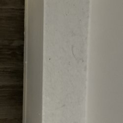 Crest Motel - Dirt and hair on baseboards