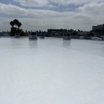 Roofing Systems Incorporated - Silicone coating over flat asphalt roof - Roofing Near Me - Los Angeles, California Roofing Systems Incorporated - Silicone coating over flat asphalt roof - Roofing Near Me - Los Angeles, California