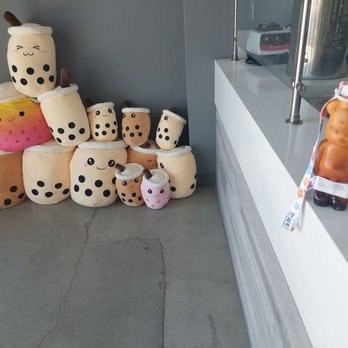 Chakaa Tea Cafe - Thai iced tea with almond milk and boba in bear with lanyard - Bubble Tea Near Me - Thousand Oaks, California