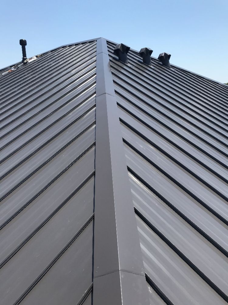 Slide of J & T Roofing Services