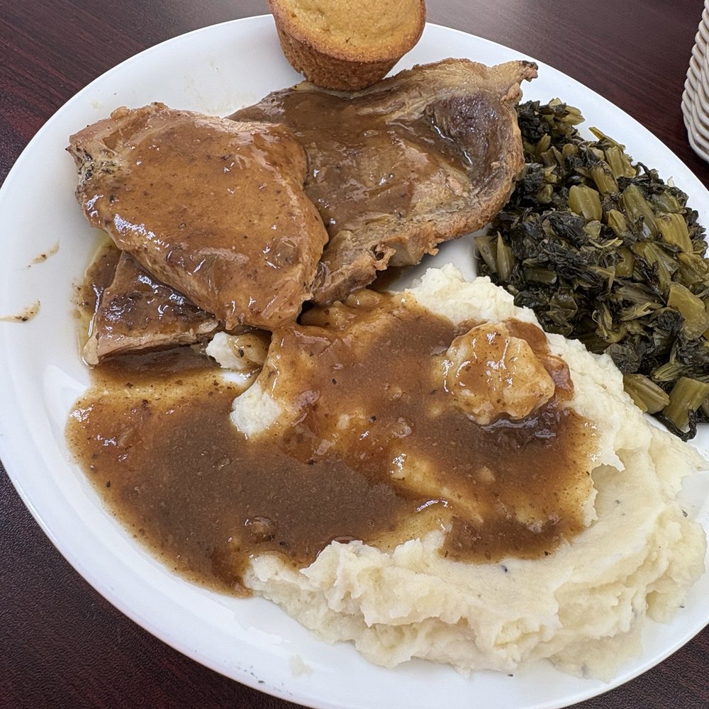 Cindy's - Baked smothered pork chops, turnip greens and mashed potatoes and gravy. It was delicious!! - American Near Me - Marlin, Texas Cindy's - Baked smothered pork chops, turnip greens and mashed potatoes and gravy. It was delicious!! - American Near Me - Marlin, Texas