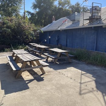The Iron Daisy - Outdoor picnic tables next to Iron Daisy. - Mexican Near Me - Tallahassee, Florida The Iron Daisy - Outdoor picnic tables next to Iron Daisy. - Mexican Near Me - Tallahassee, Florida