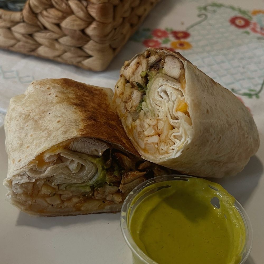 The Press - Chicken burrito and spicy sauce - Mexican Near Me - Charleston, South Carolina The Press - Chicken burrito and spicy sauce - Mexican Near Me - Charleston, South Carolina