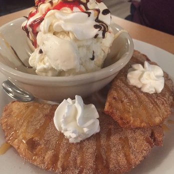B-Unos - Two homemade apple empanada with cinnamon sugar vanilla ice cream and whipped cream. - Breakfast & Brunch Near Me - Burlington, New Jersey B-Unos - Two homemade apple empanada with cinnamon sugar vanilla ice cream and whipped cream. - Breakfast & Brunch Near Me - Burlington, New Jersey