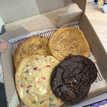 Insomnia Cookies - 4 pack of cookies confetti  deluxe, salted caramel deluxe, double chocolate chunk and snickerdoodle cookie - Desserts Near Me - San Diego, California