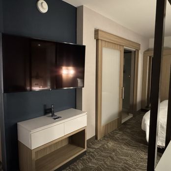 SpringHill Suites by Marriott Columbus Dublin - King suite, bedroom, sitting area, and bathroom. - Hotels Near Me - Dublin, Ohio SpringHill Suites by Marriott Columbus Dublin - King suite, bedroom, sitting area, and bathroom. - Hotels Near Me - Dublin, Ohio