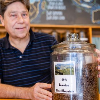Ahrre's Coffee Roastery - a man holding a jar of coffee beans - Coffee Roasteries Near Me - Westfield, New Jersey Ahrre's Coffee Roastery - a man holding a jar of coffee beans - Coffee Roasteries Near Me - Westfield, New Jersey