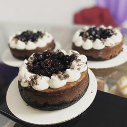 Sugarcane and Shepherd Desserts - Black Forest Cheesecake. Chocolate cookie crust, Chocolate cheesecake filling, cherry compote, chantilly cream, chocolate curls.