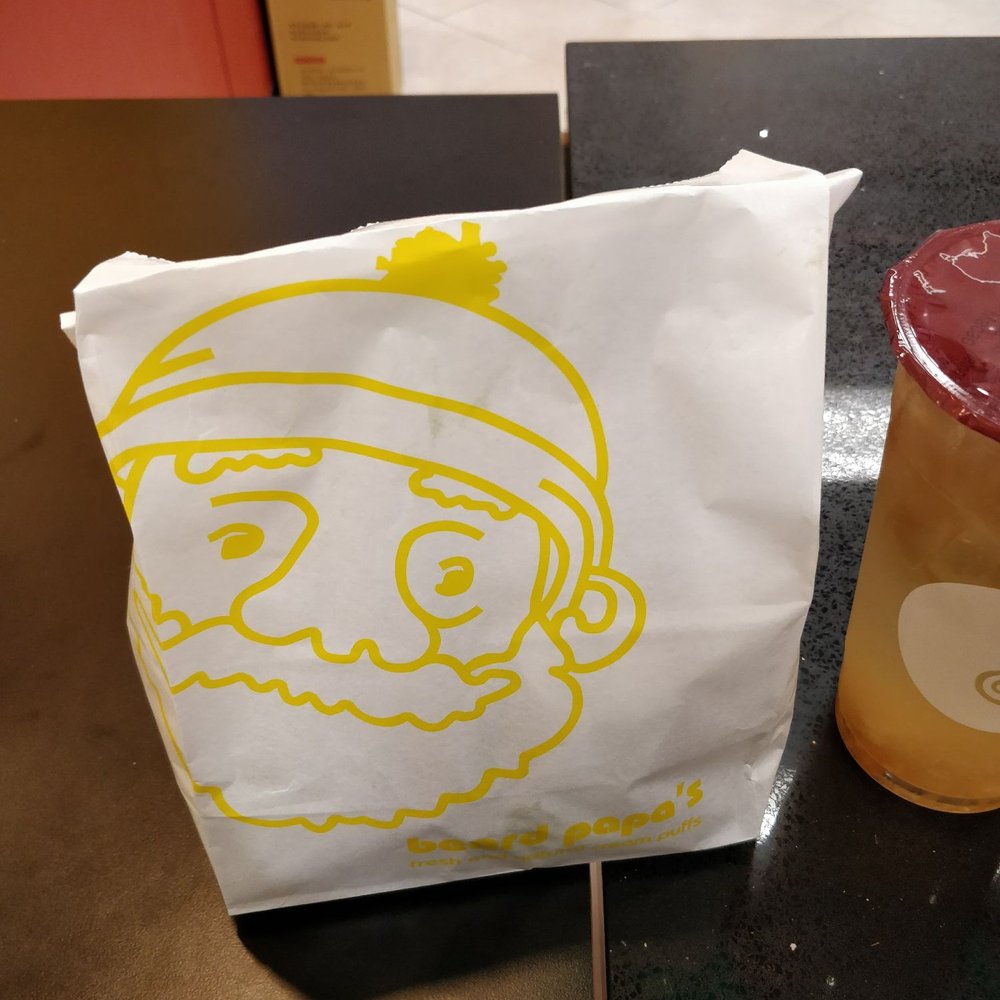 Beard Papa's - Cute bag. They pack it in a bag only if you order less than 4 I believe - Desserts Near Me - Flushing, New York Beard Papa's - Cute bag. They pack it in a bag only if you order less than 4 I believe - Desserts Near Me - Flushing, New York