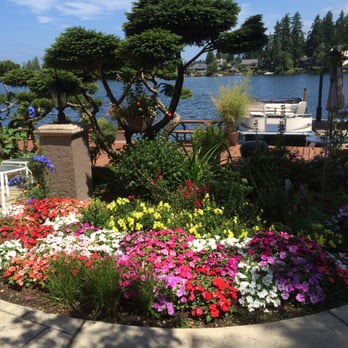 VanTran Gardening - a flower bed in front of a lake - Landscaping Near Me - University Place, Washington VanTran Gardening - a flower bed in front of a lake - Landscaping Near Me - University Place, Washington