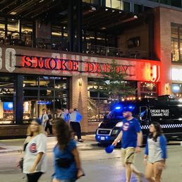 Exterior outside entrance of Smoke Daddy - Storefront at night - Chicago, Illinois Exterior outside entrance of Smoke Daddy - Storefront at night - Chicago, Illinois
