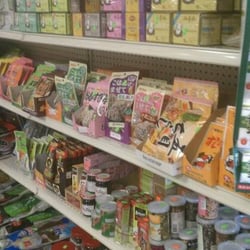 Young Oriental Food & Gift Mart - Tea, candy and spice packets.