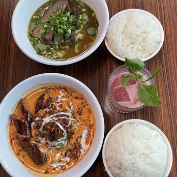 Eem - Spicy Jungle Curry with Sliced Brisket  (top) Red Curry with Roasted Vegetables with added sausage (bottom) - Cocktail Bars Near Me - Portland, Oregon