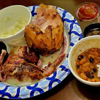 Woodpeckers Backyard BBQ - 1/2 of a chicken to-go with baked beans & almost finished datil slaw. - Barbeque Near Me - Saint Augustine, Florida