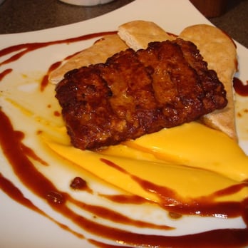 Ameriqual Packaging - Pork rib in it's jus, with rustic flatbread, queso fundito, and steak sauce - Packing Services Near Me - Evansville, Indiana Ameriqual Packaging - Pork rib in it's jus, with rustic flatbread, queso fundito, and steak sauce - Packing Services Near Me - Evansville, Indiana