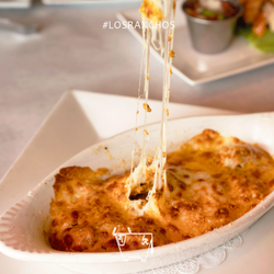 Los Ranchos Steakhouse - Experience exquisite flavors at our restaurant. Indulge in our best Latin dishes that will tantalize your taste buds and transport you.