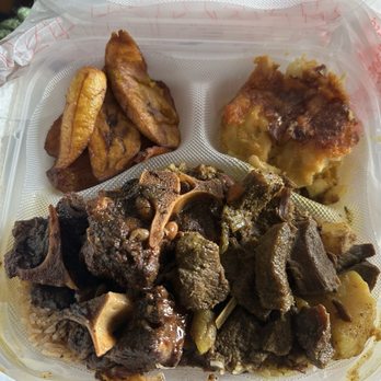 Island Grill - Oxtail and curry goat with rice, macaroni and cheese and plantain - Caribbean Near Me - Columbia, South Carolina Island Grill - Oxtail and curry goat with rice, macaroni and cheese and plantain - Caribbean Near Me - Columbia, South Carolina